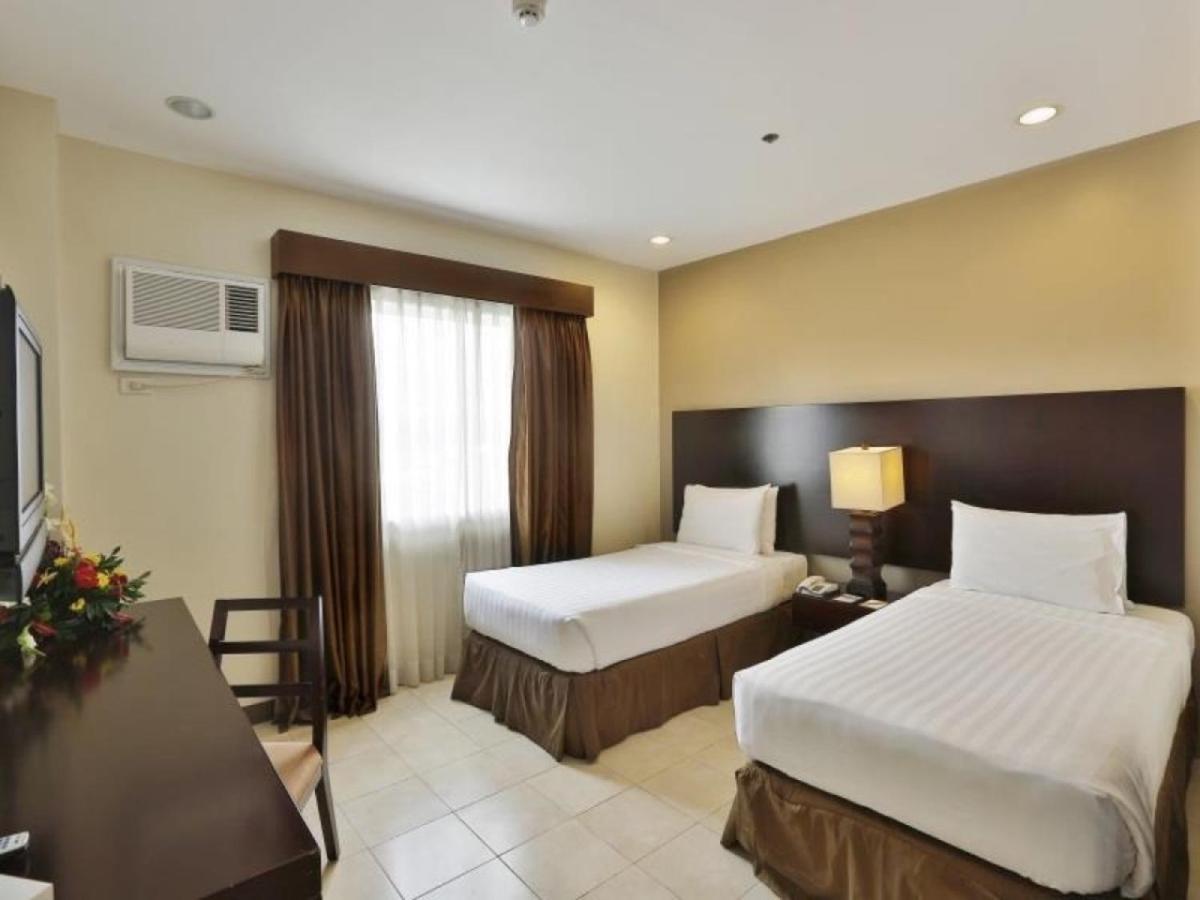סבו Alpa City Suites Hotel מראה חיצוני תמונה